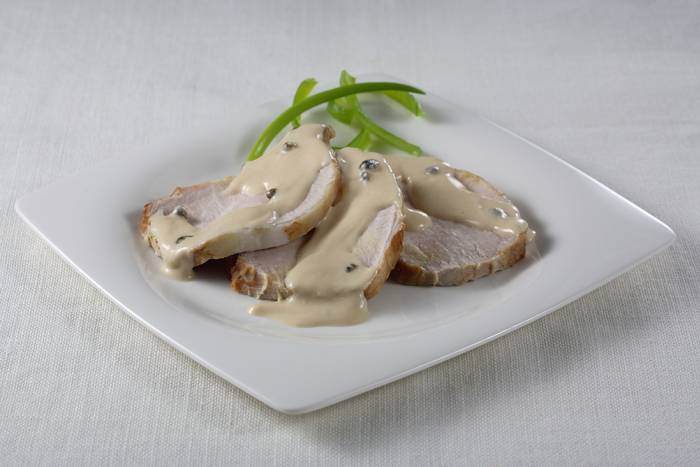 Lomo a la pimienta verde con nata