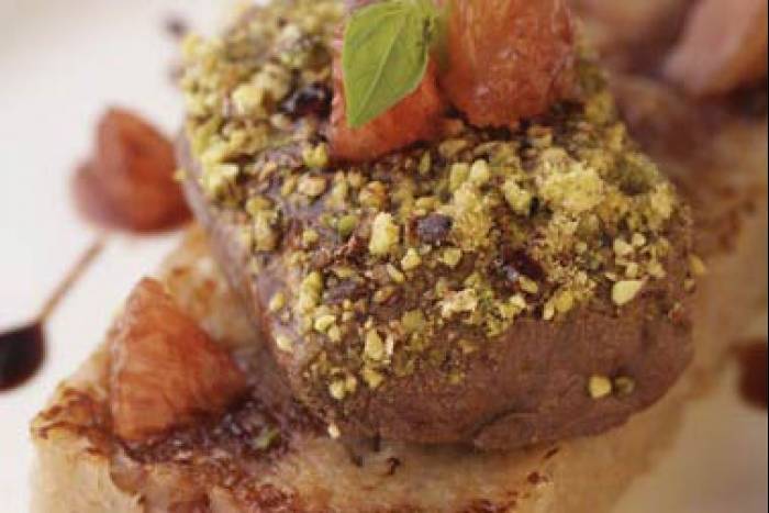 Magret de pato rebozado en pistachos