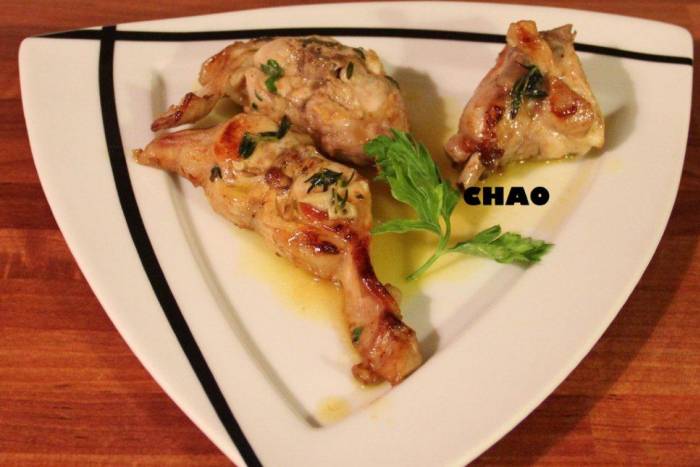 Conejo asado al zumo de naranja